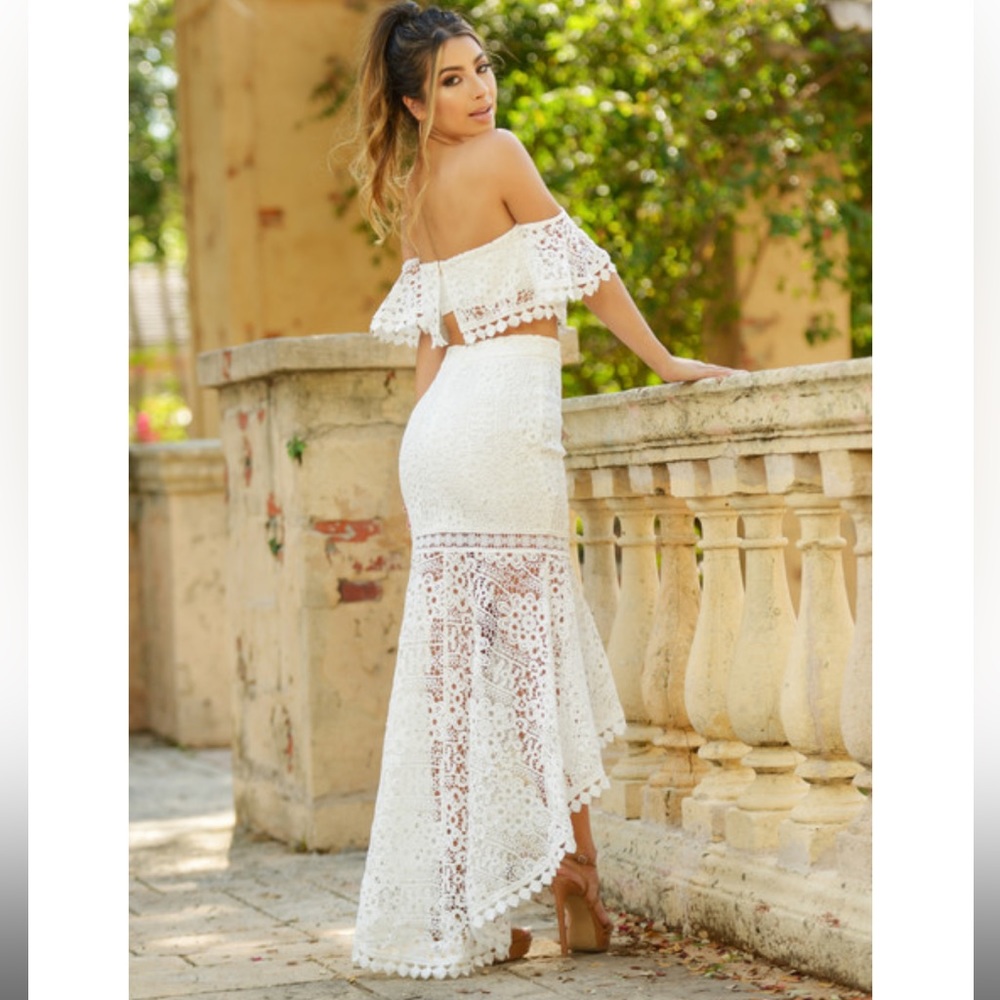 Jaus two-piece lace detail midi skirt and crop top.